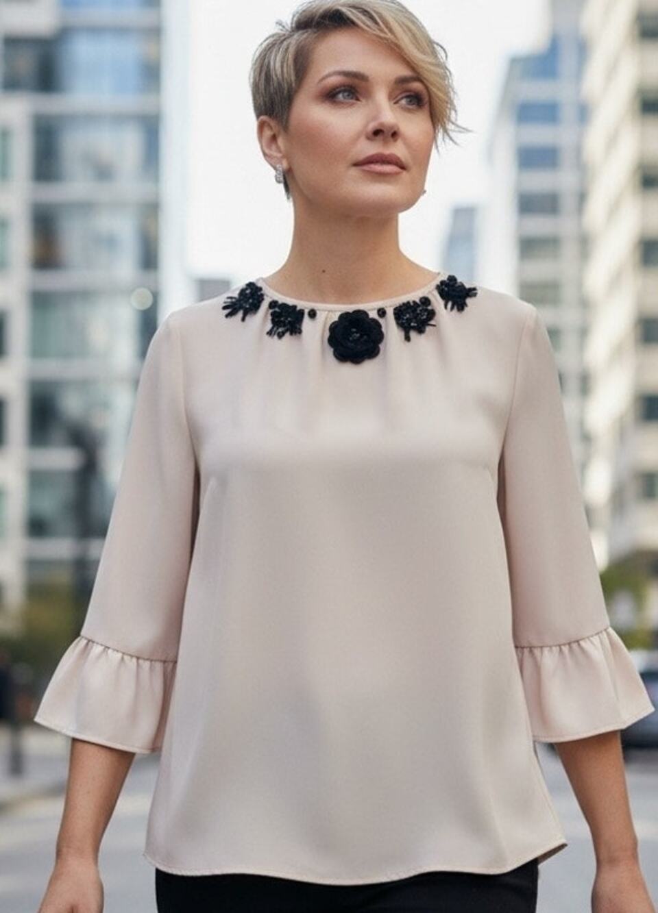 Kate Spade Elegant Pale Pink Top with Black Embellishments